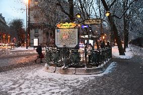 Streets Of Paris Covered With A Snow Blanket