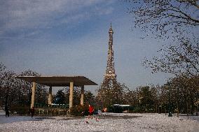 Streets Of Paris Covered With A Snow Blanket