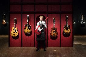The Mark Knopfler Guitar Collection Photocall At Christie's In London