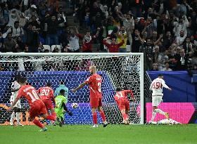(SP)QATAR-DOHA-FOOTBALL-AFC ASIAN CUP-GROUP C-PALESTINE VS UNITED ARAB EMIRATES