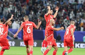 (SP)QATAR-DOHA-FOOTBALL-AFC ASIAN CUP-GROUP C-PALESTINE VS UNITED ARAB EMIRATES