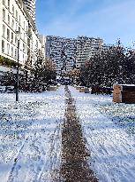 Streets Of Paris Covered With A Snow Blanket