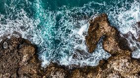 Drone View Of Cliff With Waves In The Ionic Coast