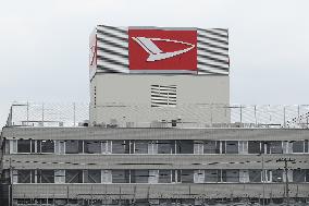 Exterior of Daihatsu Motor Co. headquarters, logo and signage