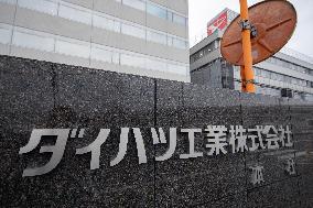 Exterior of Daihatsu Motor Co. headquarters, logo and signage
