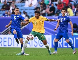 (SP)QATAR-DOHA-FOOTBALL-AFC ASIAN CUP-GROUP B-UZBEKISTAN VS AUSTRALIA