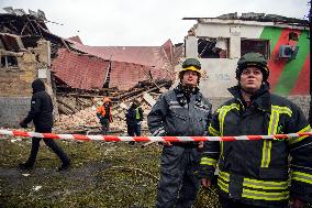 Police And Rescuers Work At The Site Of A Russian Cruise Missile That Destroyed A Sports Complex In Central Kyiv