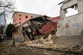 Police And Rescuers Work At The Site Of A Russian Cruise Missile That Destroyed A Sports Complex In Central Kyiv