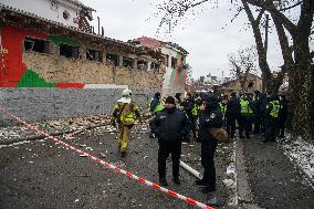 Police And Rescuers Work At The Site Of A Russian Cruise Missile That Destroyed A Sports Complex In Central Kyiv