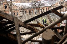 Police And Rescuers Work At The Site Of A Russian Cruise Missile That Destroyed A Sports Complex In Central Kyiv