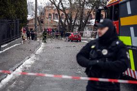 Police And Rescuers Work At The Site Of A Russian Cruise Missile That Destroyed A Sports Complex In Central Kyiv