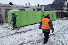 Rebuilding residential quarter in Irpin