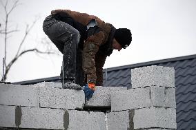 Rebuilding residential quarter in Irpin