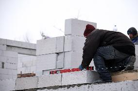 Rebuilding residential quarter in Irpin