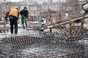 Rebuilding residential quarter in Irpin