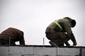 Rebuilding residential quarter in Irpin