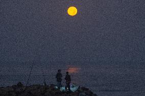 The Wolf Moon Is Seen Over Colombo, Sri Lanka.