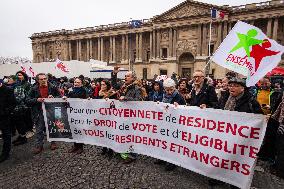 Demonstration Against New Immigration Law In Paris