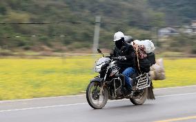 Migrant Workers Ride Motorcycles Home for The Spring Festival