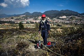 Firefighters Fight Wildfires In Bogota