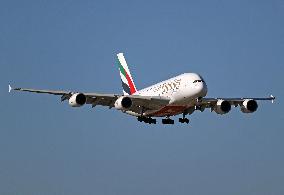 Diverse Emirates Airbus A380 landing in Barcelona