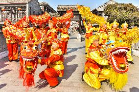 Farmers Perform A Dragon Dance For Tourists in Taizhou