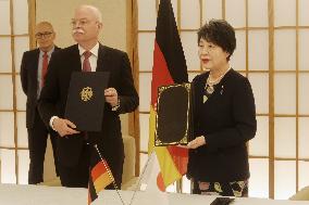 Japan, Germany sign military supply-sharing pact
