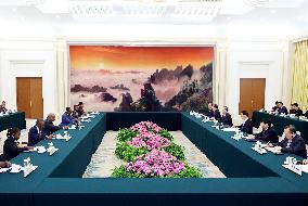 CHINA-BEIJING-WANG HUNING-RWANDAN PATRIOTIC FRONT DELEGATION-MEETING (CN)