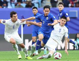 (SP)QATAR-DOHA-FOOTBALL-AFC ASIAN CUP-UZBEKISTAN VS THAILAND