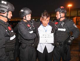 CHINA-YUNNAN-KUNMING-CRIMINAL SUSPECTS-MYANMAR-HANDOVER (CN)