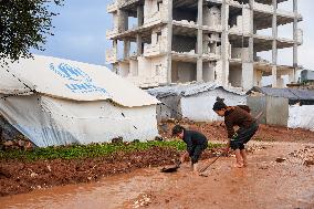 Jindires, One Year After The Earthquake, Camps Sink Into Mud And Clay