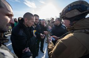 Russia And Ukraine Exchange POWs After Plane Crash