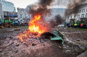 Farmers Set Some Fire Ouside The EU Parliament - Brussels