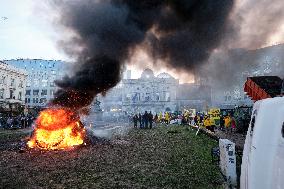 Farmers Set Some Fire Ouside The EU Parliament - Brussels