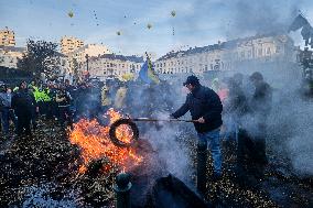 Farmers Set Some Fire Ouside The EU Parliament - Brussels