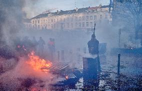 Farmers Set Some Fire Ouside The EU Parliament - Brussels