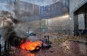 Farmers Set Some Fire Ouside The EU Parliament - Brussels