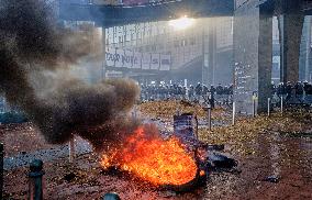 Farmers Set Some Fire Ouside The EU Parliament - Brussels