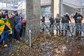 Farmers Set Some Fire Ouside The EU Parliament - Brussels