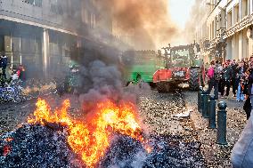 Farmers Set Some Fire Ouside The EU Parliament - Brussels