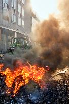 Farmers Set Some Fire Ouside The EU Parliament - Brussels