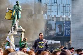 Farmers Set Some Fire Ouside The EU Parliament - Brussels