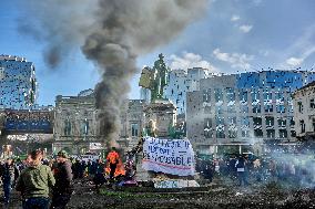 Farmers Set Some Fire Ouside The EU Parliament - Brussels