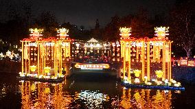 Visitors View Lanterns at Bailuzhou Park in Nanjing