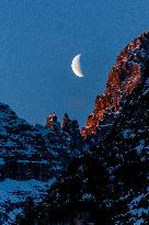 Waning Crescent Moon Seen At Monte Cristallo, Italian Dolomites