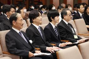 CORRECTED: Crown Prince, son attend event in Tokyo
