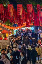 Tourists Visit The Traditional Style Shibati Area in Chongqing