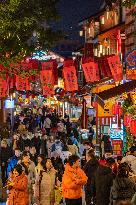 Tourists Visit The Traditional Style Shibati Area in Chongqing