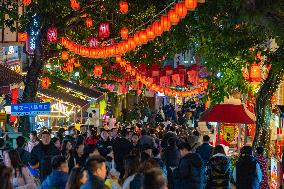 Tourists Visit The Traditional Style Shibati Area in Chongqing