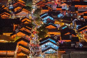 Tourists Visit The Traditional Style Shibati Area in Chongqing